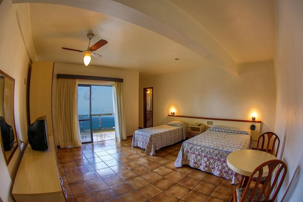 Flipper Hotel Laguna Bagian luar foto
